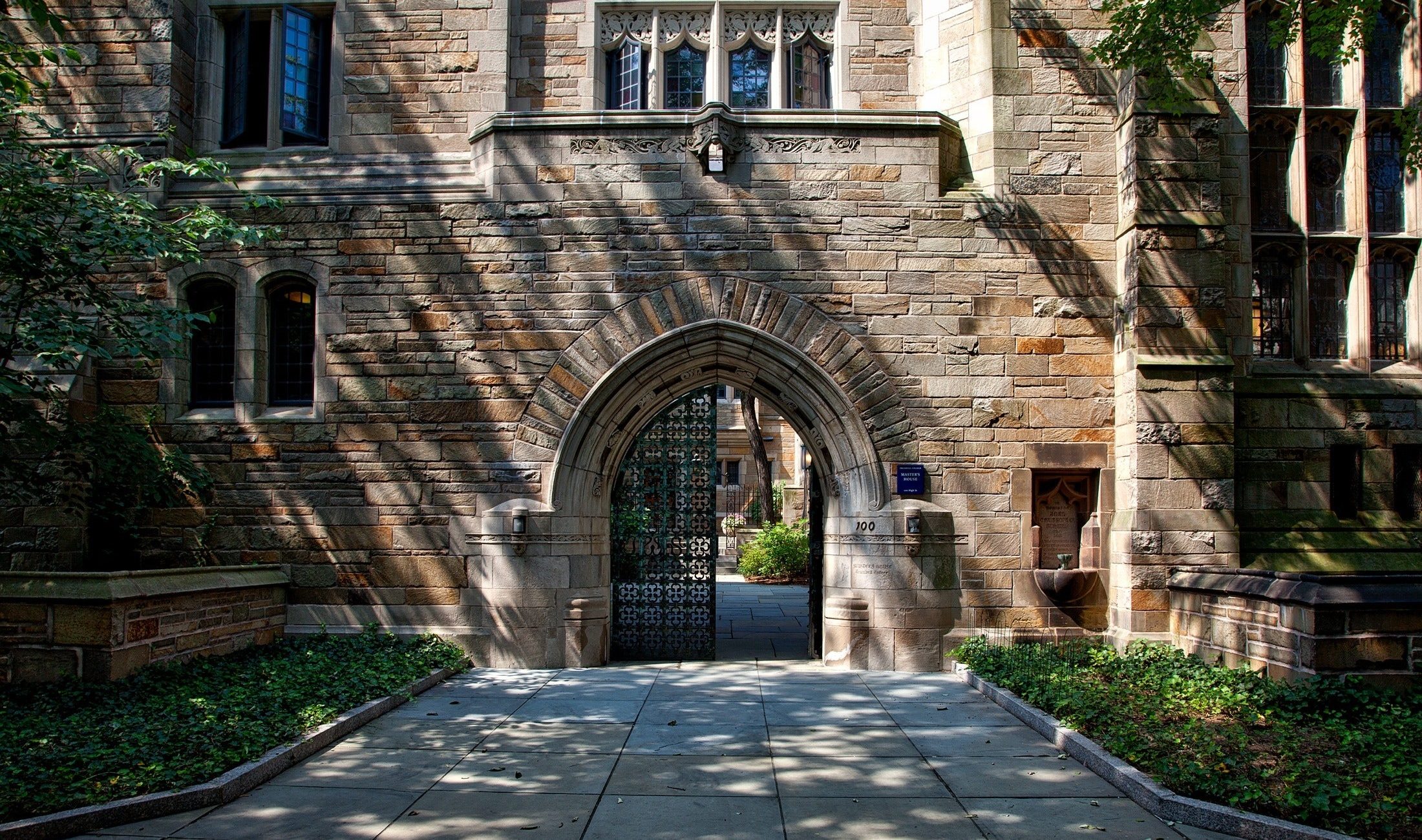 steel-gate-of-brown-brick-building-159490